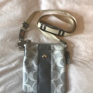 Gray/silver Coach cross body bag